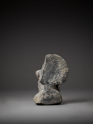 Lot 543 - A GRAY SCHIST FIGURE OF A WINGED ATLAS, GANDHARA