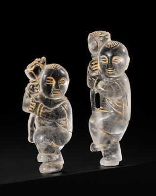 Lot 51 - A PAIR OF ROCK CRYSTAL ‘BOYS AND LOTUS’ CARVINGS, LIAO DYNASTY