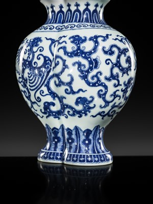 Lot 175 - AN IMPERIAL BLUE AND WHITE 'PHOENIX AND DRAGON' DOUBLE VASE AND COVER, QIANLONG MARK AND OF THE PERIOD