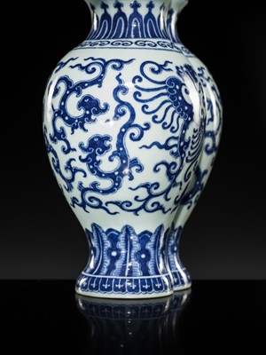 Lot 175 - AN IMPERIAL BLUE AND WHITE 'PHOENIX AND DRAGON' DOUBLE VASE AND COVER, QIANLONG MARK AND OF THE PERIOD