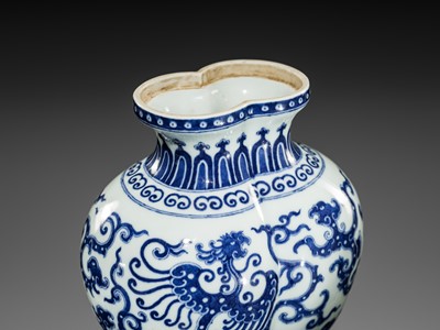 Lot 175 - AN IMPERIAL BLUE AND WHITE 'PHOENIX AND DRAGON' DOUBLE VASE AND COVER, QIANLONG MARK AND OF THE PERIOD