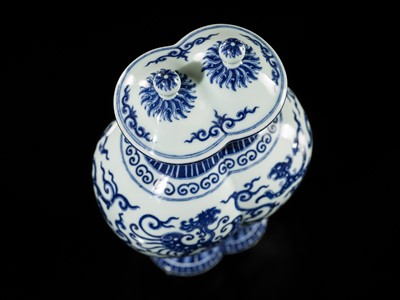 Lot 175 - AN IMPERIAL BLUE AND WHITE 'PHOENIX AND DRAGON' DOUBLE VASE AND COVER, QIANLONG MARK AND OF THE PERIOD