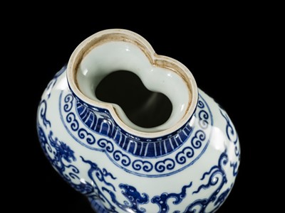 Lot 175 - AN IMPERIAL BLUE AND WHITE 'PHOENIX AND DRAGON' DOUBLE VASE AND COVER, QIANLONG MARK AND OF THE PERIOD