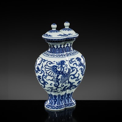 Lot 175 - AN IMPERIAL BLUE AND WHITE 'PHOENIX AND DRAGON' DOUBLE VASE AND COVER, QIANLONG MARK AND OF THE PERIOD