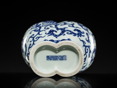 Lot 175 - AN IMPERIAL BLUE AND WHITE 'PHOENIX AND DRAGON' DOUBLE VASE AND COVER, QIANLONG MARK AND OF THE PERIOD
