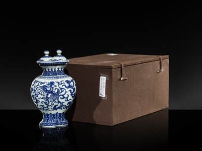 Lot 175 - AN IMPERIAL BLUE AND WHITE 'PHOENIX AND DRAGON' DOUBLE VASE AND COVER, QIANLONG MARK AND OF THE PERIOD