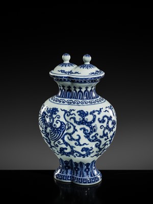 Lot 175 - AN IMPERIAL BLUE AND WHITE 'PHOENIX AND DRAGON' DOUBLE VASE AND COVER, QIANLONG MARK AND OF THE PERIOD