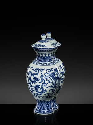 Lot 175 - AN IMPERIAL BLUE AND WHITE 'PHOENIX AND DRAGON' DOUBLE VASE AND COVER, QIANLONG MARK AND OF THE PERIOD