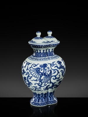 Lot 175 - AN IMPERIAL BLUE AND WHITE 'PHOENIX AND DRAGON' DOUBLE VASE AND COVER, QIANLONG MARK AND OF THE PERIOD