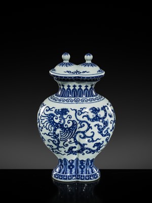 Lot 175 - AN IMPERIAL BLUE AND WHITE 'PHOENIX AND DRAGON' DOUBLE VASE AND COVER, QIANLONG MARK AND OF THE PERIOD