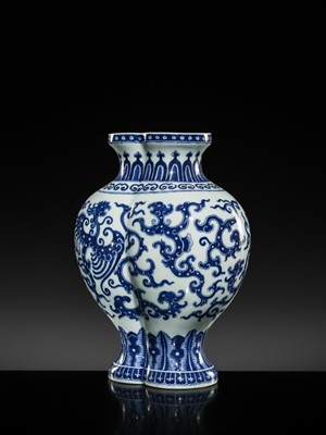Lot 175 - AN IMPERIAL BLUE AND WHITE 'PHOENIX AND DRAGON' DOUBLE VASE AND COVER, QIANLONG MARK AND OF THE PERIOD