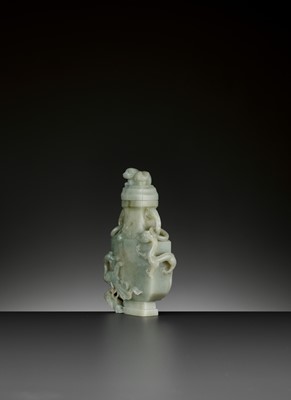 Lot 73 - A CELADON AND GREY JADE BALUSTER VASE AND COVER, QING DYNASTY
