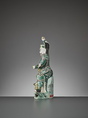 Lot 215 - A FAMILLE VERTE BISCUIT FIGURE OF CAISHEN IN WRATHFUL GUISE, KANGXI