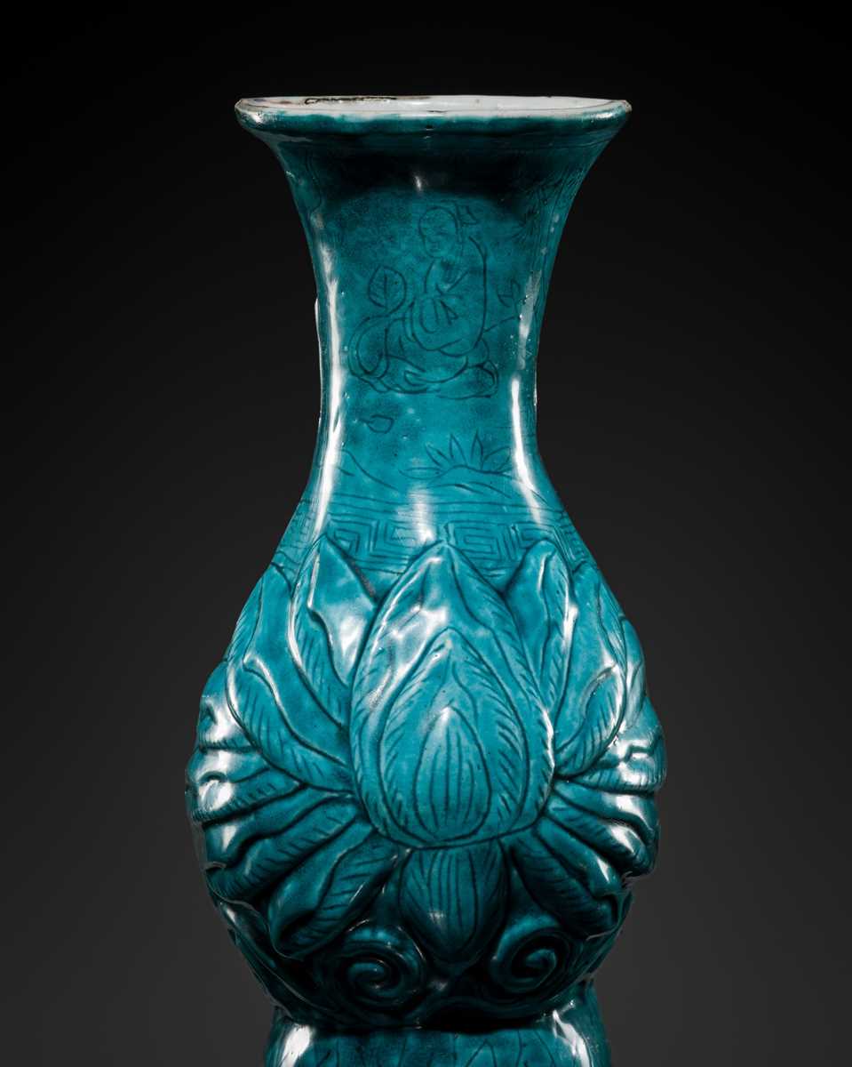 Lot 21 - AN EXTREMELY RARE TURQUOISE-GLAZED ‘LOTUS’ WALL VASE, WANLI MARK AND PERIOD