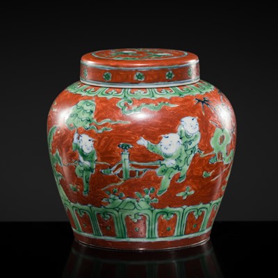 Lot 205 - AN IRON-RED AND GREEN-GLAZED ‘CHILDREN AT PLAY’ VASE AND COVER