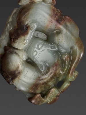 Lot 84 - A CELADON AND RUSSET JADE ‘CHILONG’ PENDANT, QING DYNASTY