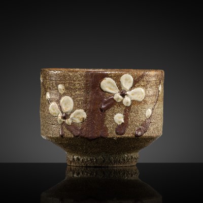 Lot 310 - A FINE WHITE- AND BROWN-GLAZED STONEWARE ‘PRUNUS’ TEA BOWL (CHAWAN)