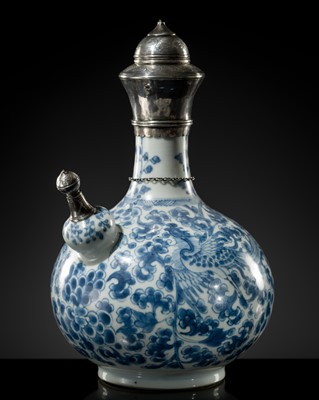 Lot 26 - A SILVER-MOUNTED BLUE AND WHITE ’PHOENIX’ KENDI, FOR THE ISLAMIC EXPORT MARKET, LATE MING TO EARLY QING DYNASTY