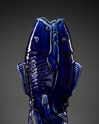 Lot 37 - A DEEP BLUE GLAZED ‘TWO FISH’ VASE, QING DYNASTY