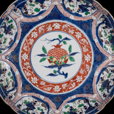 Lot 198 - A LARGE WUCAI BARBED RIM DISH WITH POMEGRANATE AND GRAPEVINES, 18TH CENTURY