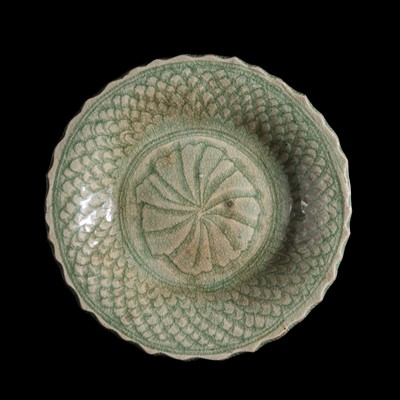 Lot 284 - A CELADON-GLAZED BARBED STONEWARE DISH, SAWANKHALOK