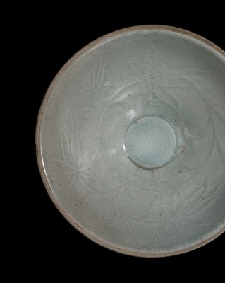 Lot 157 - A CARVED QINGBAI PORCELAIN ‘LOTUS’ BOWL, SOUTHERN SONG DYNASTY