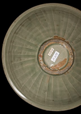 Lot 9 - A LARGE YAOZHOU CELADON-GLAZED ’CHRYSANTHEMUM’ BOWL, NORTHERN SONG-JIN DYNASTY