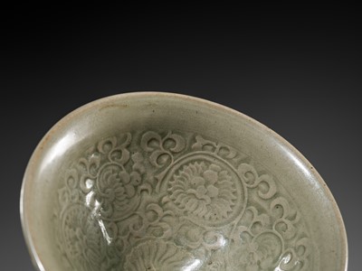 Lot 9 - A LARGE YAOZHOU CELADON-GLAZED ’CHRYSANTHEMUM’ BOWL, NORTHERN SONG-JIN DYNASTY