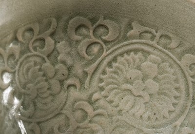 Lot 9 - A LARGE YAOZHOU CELADON-GLAZED ’CHRYSANTHEMUM’ BOWL, NORTHERN SONG-JIN DYNASTY