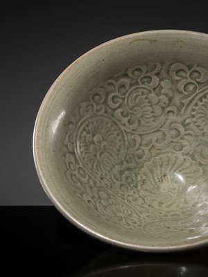 Lot 9 - A LARGE YAOZHOU CELADON-GLAZED ’CHRYSANTHEMUM’ BOWL, NORTHERN SONG-JIN DYNASTY