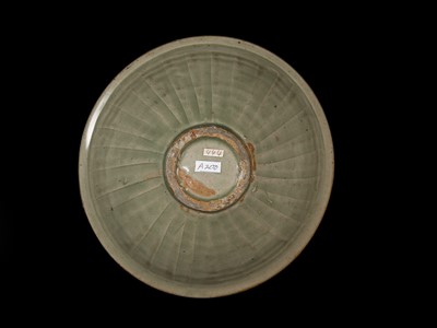 Lot 9 - A LARGE YAOZHOU CELADON-GLAZED ’CHRYSANTHEMUM’ BOWL, NORTHERN SONG-JIN DYNASTY