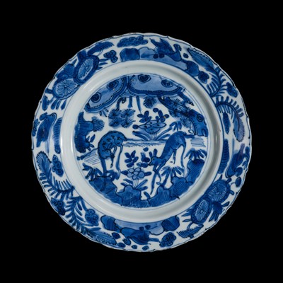 Lot 170 - A BLUE AND WHITE ‘KRAAK’ PORCELAIN DISH WITH DEER IN FOREST, MING DYNASTY, WANLI PERIOD