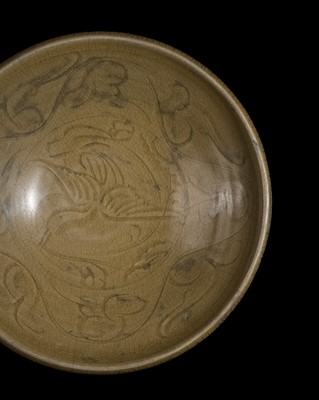 Lot 155 - A YAOZHOU CELADON-GLAZED ‘CRANE’ BOWL, NORTHERN SONG DYNASTY