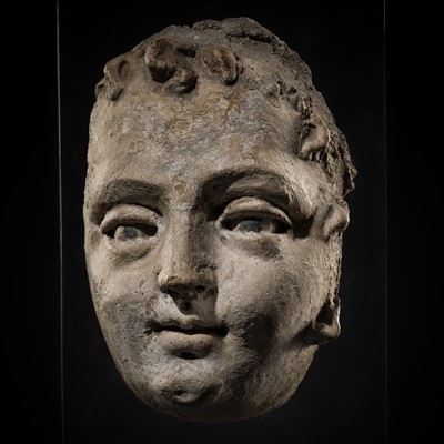 Lot 150 - A STUCCO HEAD OF A YOUTH, GREATER GREECE, HELLENISTIC PERIOD, 3RD CENTURY BC
