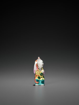 Lot 396 - A MOLDED AND ENAMELED PORCELAIN ‘LIU HAI AND TOAD’ SNUFF BOTTLE, REPUBLIC