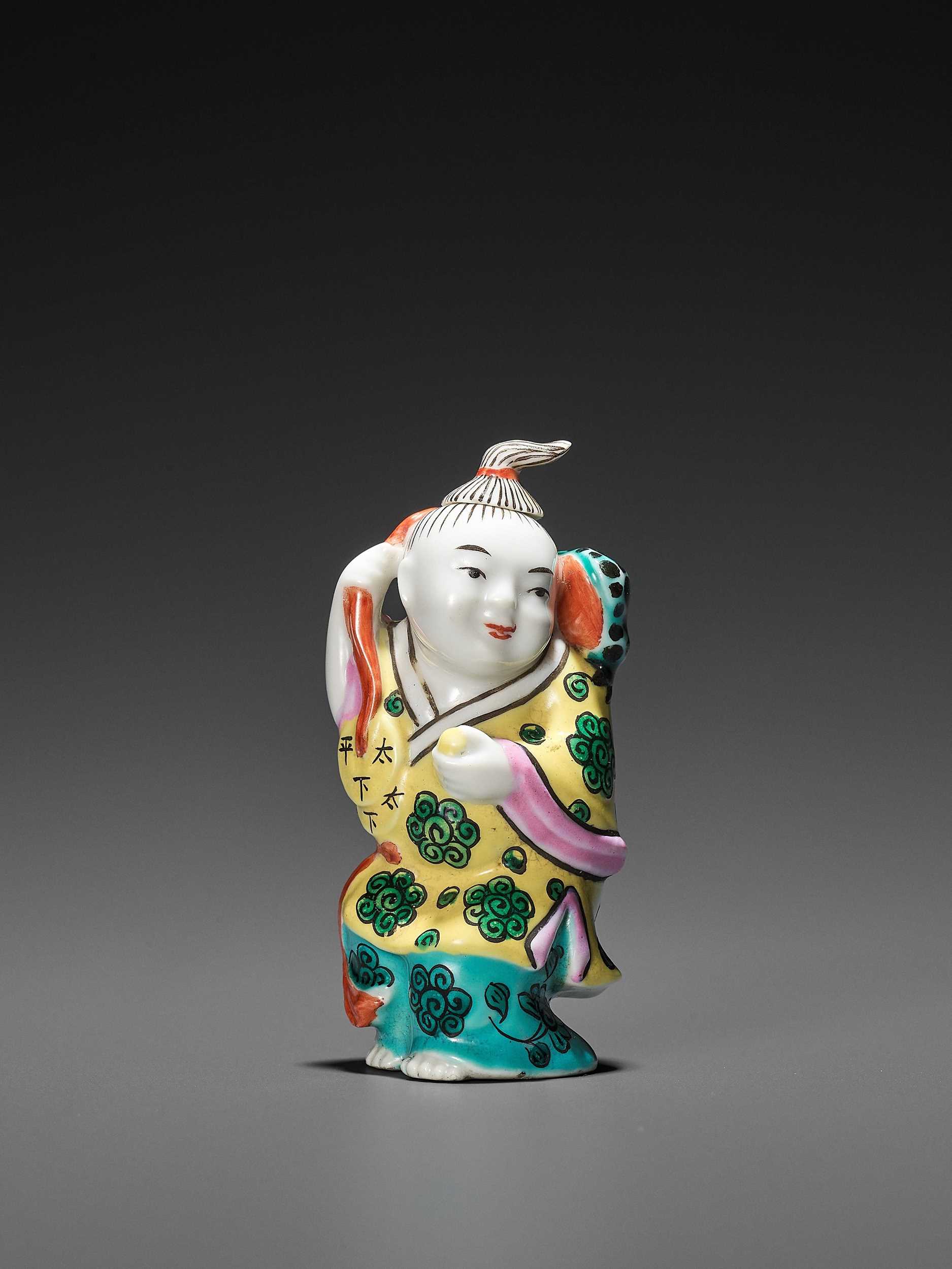 Lot 396 - A MOLDED AND ENAMELED PORCELAIN ‘LIU HAI AND TOAD’ SNUFF BOTTLE, REPUBLIC