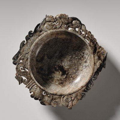 Lot 99 - A GREY AND BROWN JADE OPENWORK BRUSH WASHER (XI), HAN DYNASTY