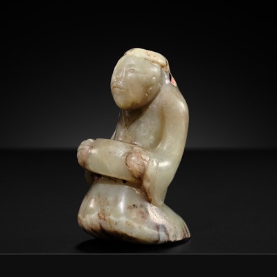 AN EXCEEDINGLY RARE PALE CELADON JADE ‘KNEELING MAN’ PENDANT, SHANG DYNASTY