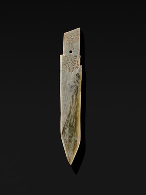 Lot 76 - A LARGE AND INSCRIBED JADE ‘TAOTIE’ CEREMONIAL DAGGER-AXE (GE), LATE SHANG DYNASTY, ANYANG PHASE