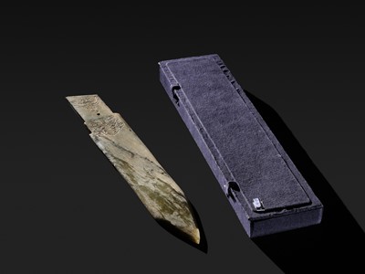 Lot 76 - A LARGE AND INSCRIBED JADE ‘TAOTIE’ CEREMONIAL DAGGER-AXE (GE), LATE SHANG DYNASTY, ANYANG PHASE