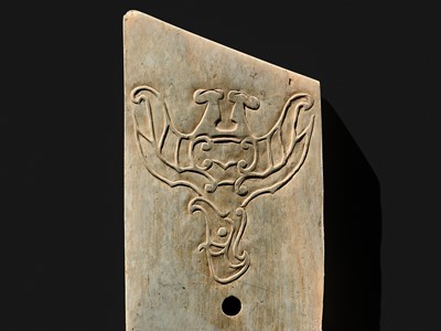 Lot 76 - A LARGE AND INSCRIBED JADE ‘TAOTIE’ CEREMONIAL DAGGER-AXE (GE), LATE SHANG DYNASTY, ANYANG PHASE