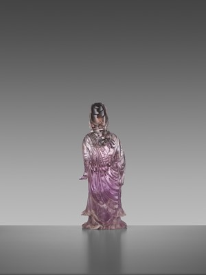 Lot 41 - A CARVED AMETHYST FIGURE OF GUANYIN, QIANLONG MARK AND OF THE PERIOD