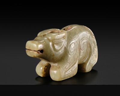 Lot 235 - A CELADON JADE ‘WATER BUFFALO’ PENDANT, LATE SHANG TO EARLY WESTERN ZHOU DYNASTY