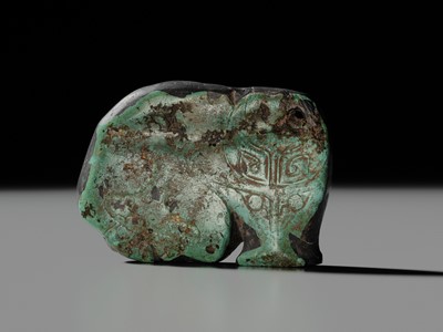 Lot 80 - A VERY RARE TURQUOISE ‘WATER BUFFALO’ PENDANT, LATE SHANG TO EARLY WESTERN ZHOU DYNASTY