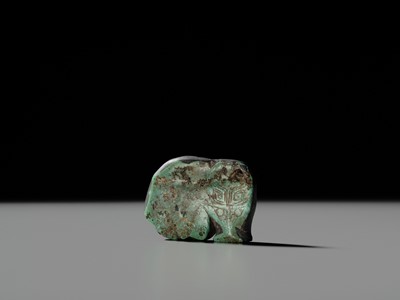Lot 80 - A VERY RARE TURQUOISE ‘WATER BUFFALO’ PENDANT, LATE SHANG TO EARLY WESTERN ZHOU DYNASTY