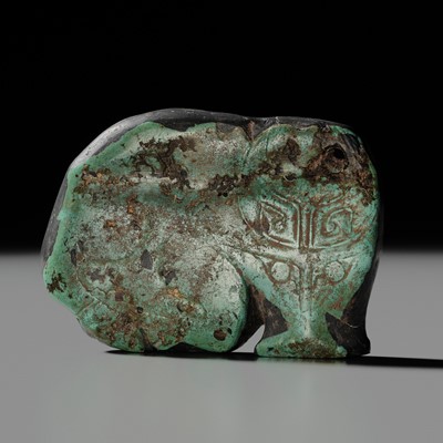 Lot 80 - A VERY RARE TURQUOISE ‘WATER BUFFALO’ PENDANT, LATE SHANG TO EARLY WESTERN ZHOU DYNASTY