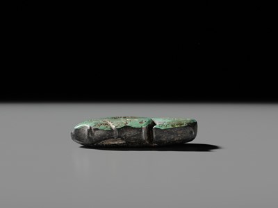 Lot 80 - A VERY RARE TURQUOISE ‘WATER BUFFALO’ PENDANT, LATE SHANG TO EARLY WESTERN ZHOU DYNASTY