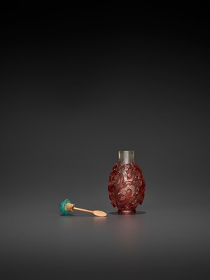 Lot 383 - A RUBY-RED OVERLAY TRANSPARENT GLASS ‘CHILONG’ SNUFF BOTTLE, QING DYNASTY