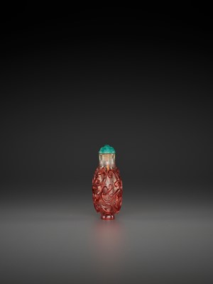 Lot 383 - A RUBY-RED OVERLAY TRANSPARENT GLASS ‘CHILONG’ SNUFF BOTTLE, QING DYNASTY