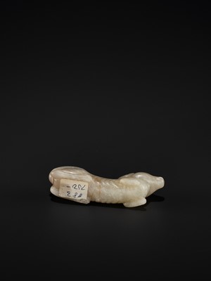 Lot 79 - A PALE GRAY JADE FIGURE OF A RECUMBENT HOUND, TANG TO SONG DYNASTY